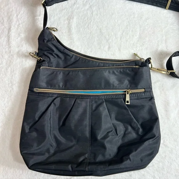 Travelon Black Crossbody Bag Gold Hardware Lockdown Features Anti-Slash Strap - Picture 1 of 16